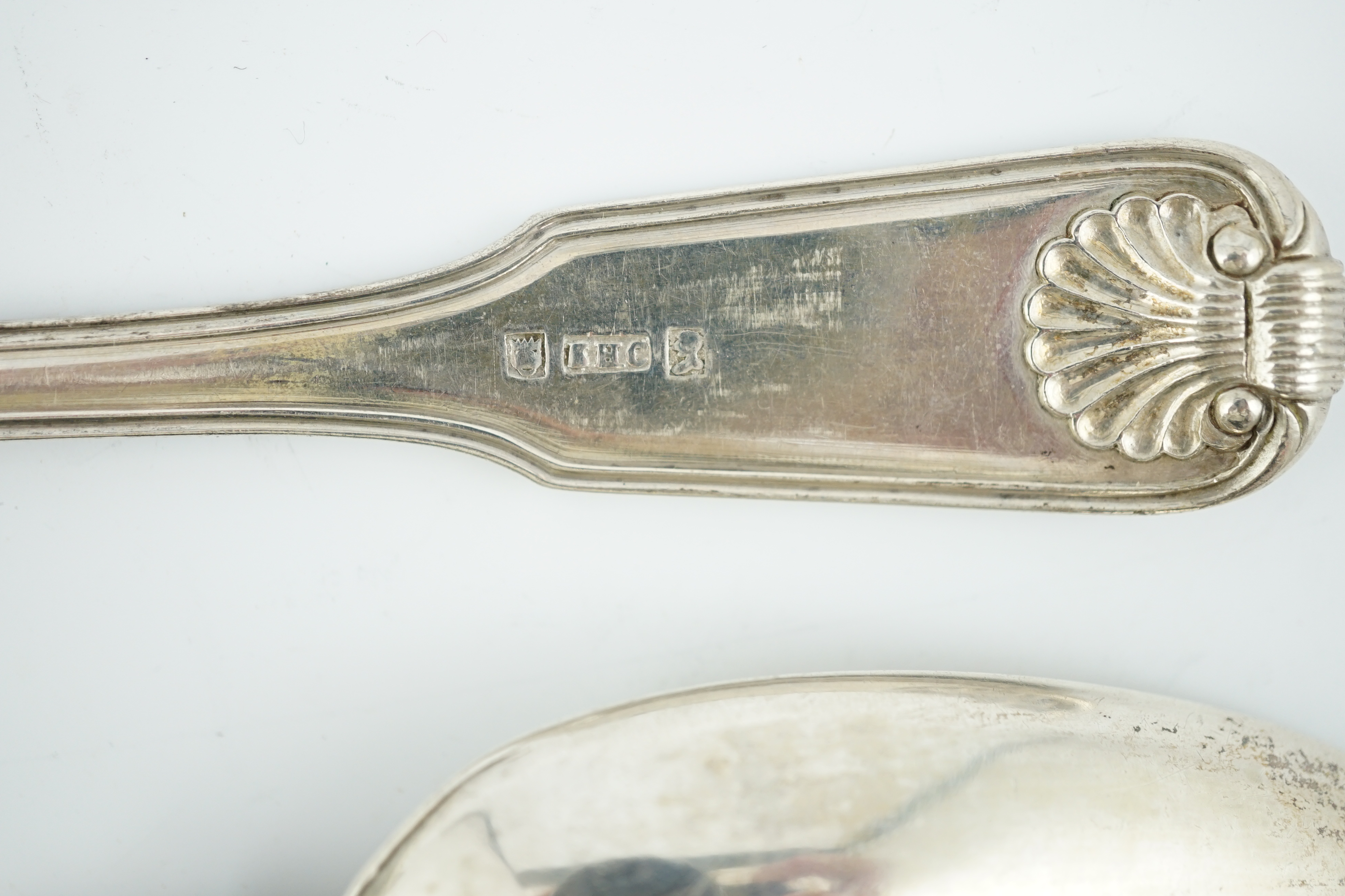 A collection of assorted mainly 19th century and later small silver and white metal items, including flatware, a photograph frame, a Japanese? scent bottle, a tea strainer, a toddy ladle, etc. Condition - poor to fair to